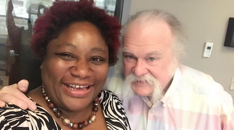 Amelia Robinson and Tom Archdeacon of the Dayton Daily News. .