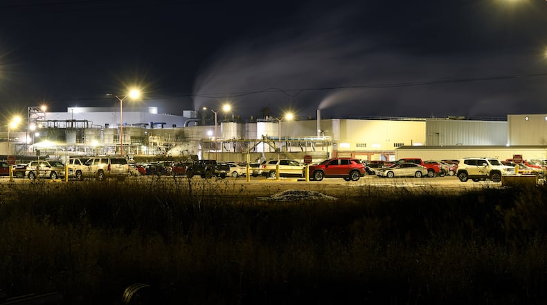 Steam rises from chimneys during the night shift at the Tyson Foods' beef plant in Lexington, Neb., Wednesday, Dec. 3, 2025. (AP Photo/Thomas Peipert)