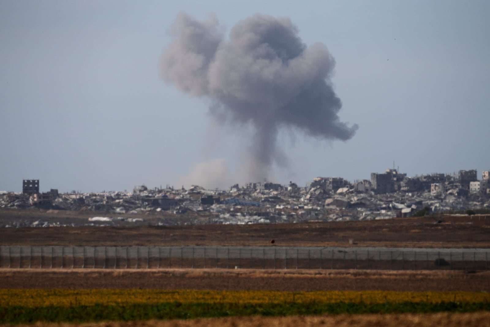 Smoke rises following an Israeli army bombardment in the Gaza Stip, as seen from southern Israel, Monday, May 19, 2025. (AP Photo/Ohad Zwigenberg)