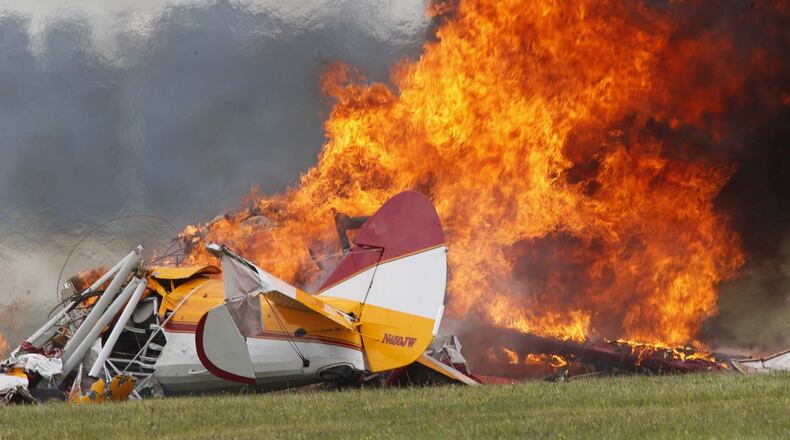Wing walker Jane Wicker and Charlie Schwenke perished in this crash at the Vectren Dayton Air Show at approximately 12:45 p.m. on Saturday, June 22. TY GREENLEES / STAFF