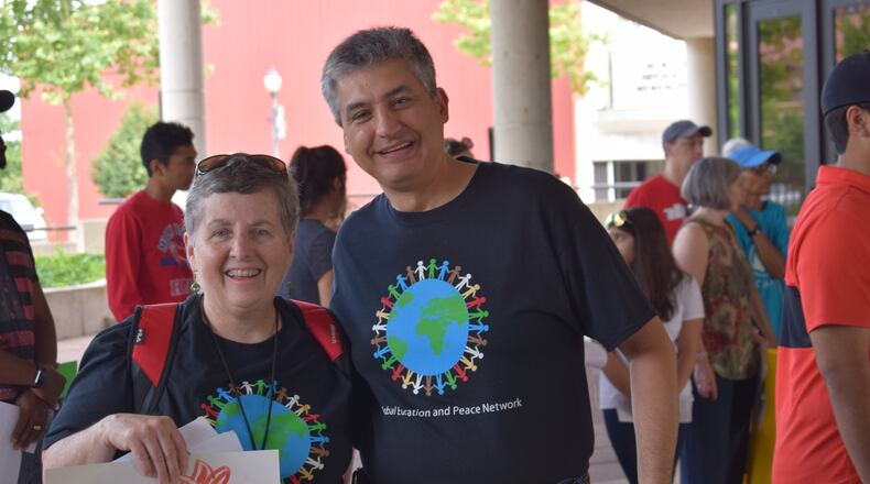 Caption: Longtime Global Education and Peace Network member Dr. Kayvon Nezhad, seen here with Nancy Flinchbaugh during the 2018 Peace Walk, will lead a program on the Baha'i faith and how it is dealing with current issues during a virtual presentation on Thursday. Courtesy photo