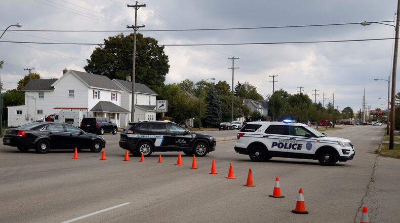 Springfield police officers blocked North Street to traffic Friday afternoon as a special response team conducted an operation. BILL LACKEY/STAFF