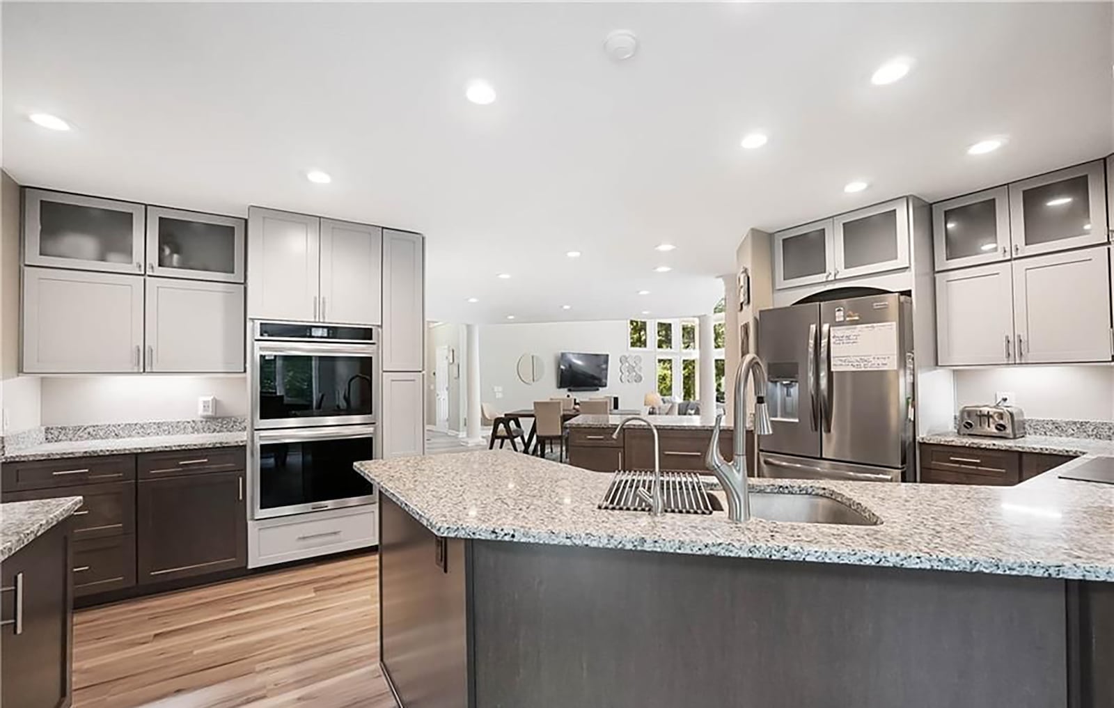 The updated kitchen has stainless appliances, LVT flooring and a breakfast nook. CONTRIBUTED