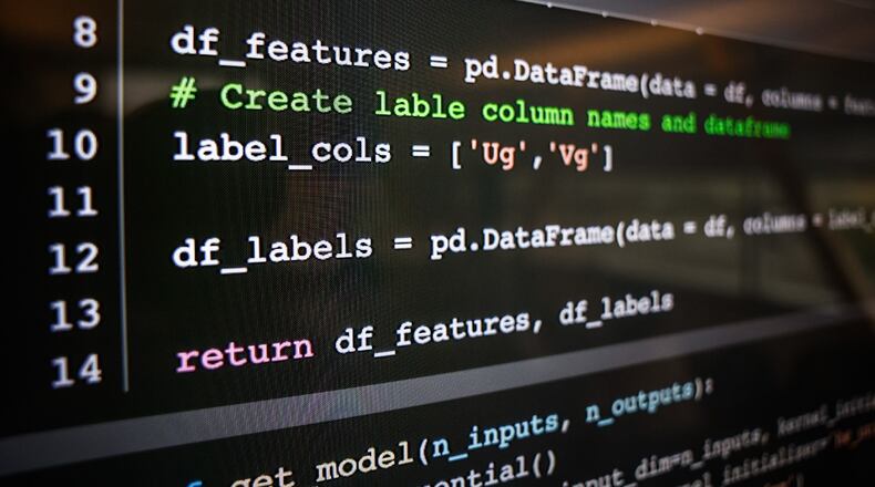 Wright State University computer science and engineering department are using artificial intelligence to write code to help people with health issues. JIM NOELKER/STAFF