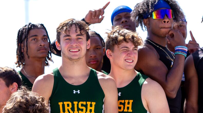 Catholic Central's 4x100 relay team of Ashton Young (front left), Tyler Young (front right), Da'Shawn Martin (back left) and Ty Myers Jr. placed second Saturday's Division III state meet at Ohio State's Jesse Owens Memorial Stadium. CONTRIBUTED/Jeff Gilbert