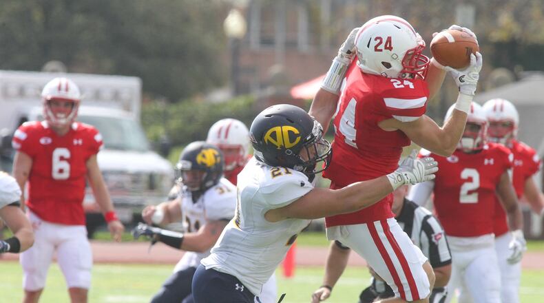 Wittenberg’s Sam Kayser makes a catch against Allegheny on Saturday, Oct. 14, 2017, at Edwards-Maurer Field in Springfield. David Jablonski/Staff