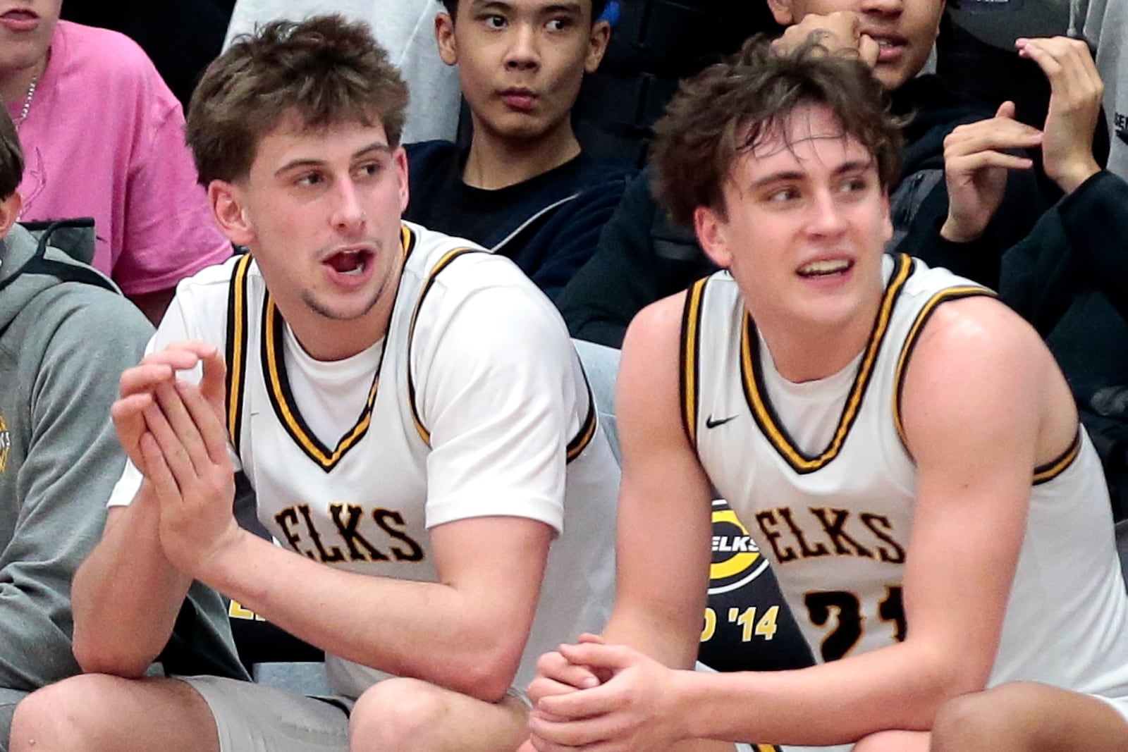 Centerville juniors Sam Keely (left) and Ty Rohrer (right) enjoy time on the becnh late in Wednesday's game. Centerville defeated Wayne 81-54 in a Greater Western Ohio Conference game on Wednesday, Jan. 28, 2026, in Centerville. STEVEN WRIGHT / STAFF