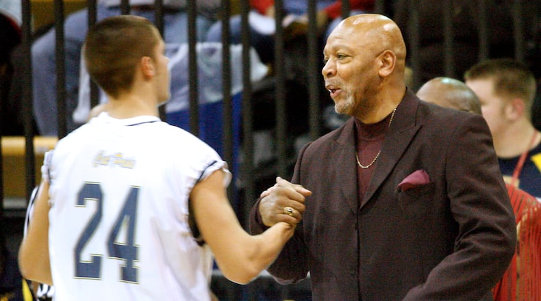 Former South High School basketball coach Larry Ham greets one of his ex-players Lucas Smith before a 2007 game against Trotwood-Madison High School, that team that Ham coached at that time. Staff Photo by Barbara J. Perenic