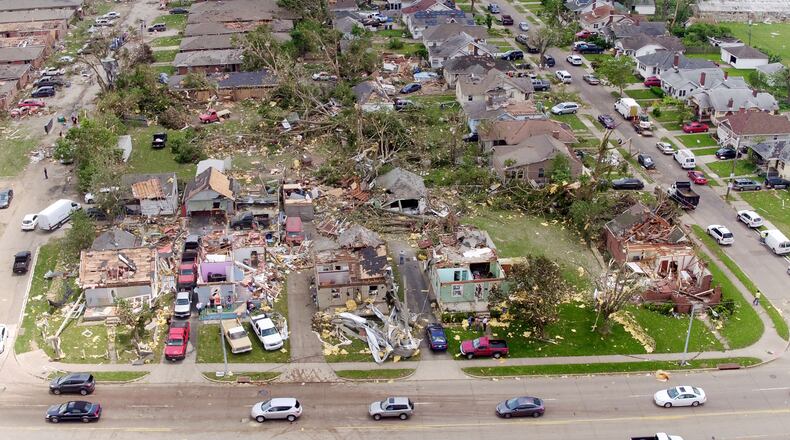 Houses in the Old North Dayton neighborhood along Troy Street where a tornado ripped through industrial buildings across the street and then the neighborhood on Monday night. TY GREENLEES / STAFF