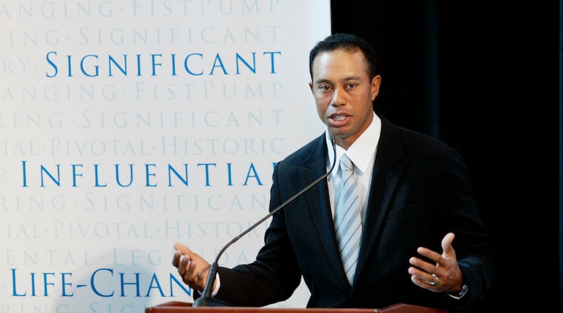 FILE - Golfer Tiger Woods announces the launch of a nationwide youth program called the "Fist Pump Challenge" in Anaheim, Calif., Jan. 21, 2008. (AP Photo/Damian Dovarganes, File)