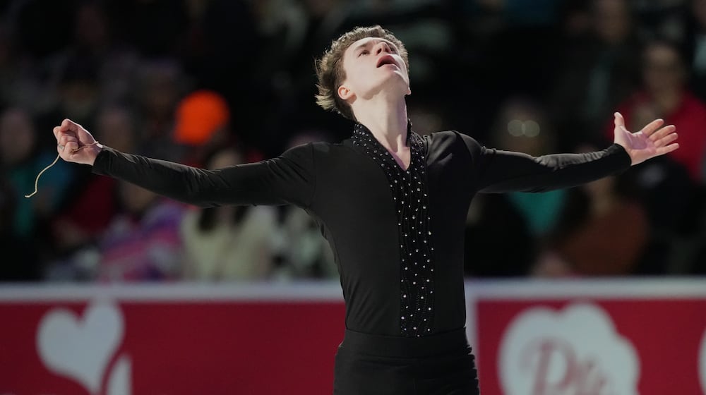 Maxim Naumov skates during the "Making Team USA" performance at the U.S. Figure Skating Championships, Sunday, Jan. 11, 2026, in St. Louis. (AP Photo/Stephanie Scarbrough)
