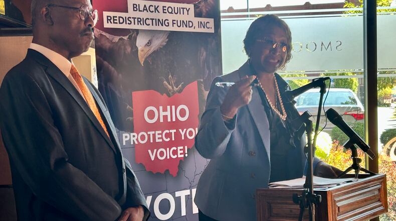 Cleveland Democrat and former Ohio lawmaker John Barnes (left) stands by Detroit Democrat and former Michigan lawmaker Sherry Gay-Dagnogo (right) on Sept. 9, 2024, as the two stump against Issue 1.