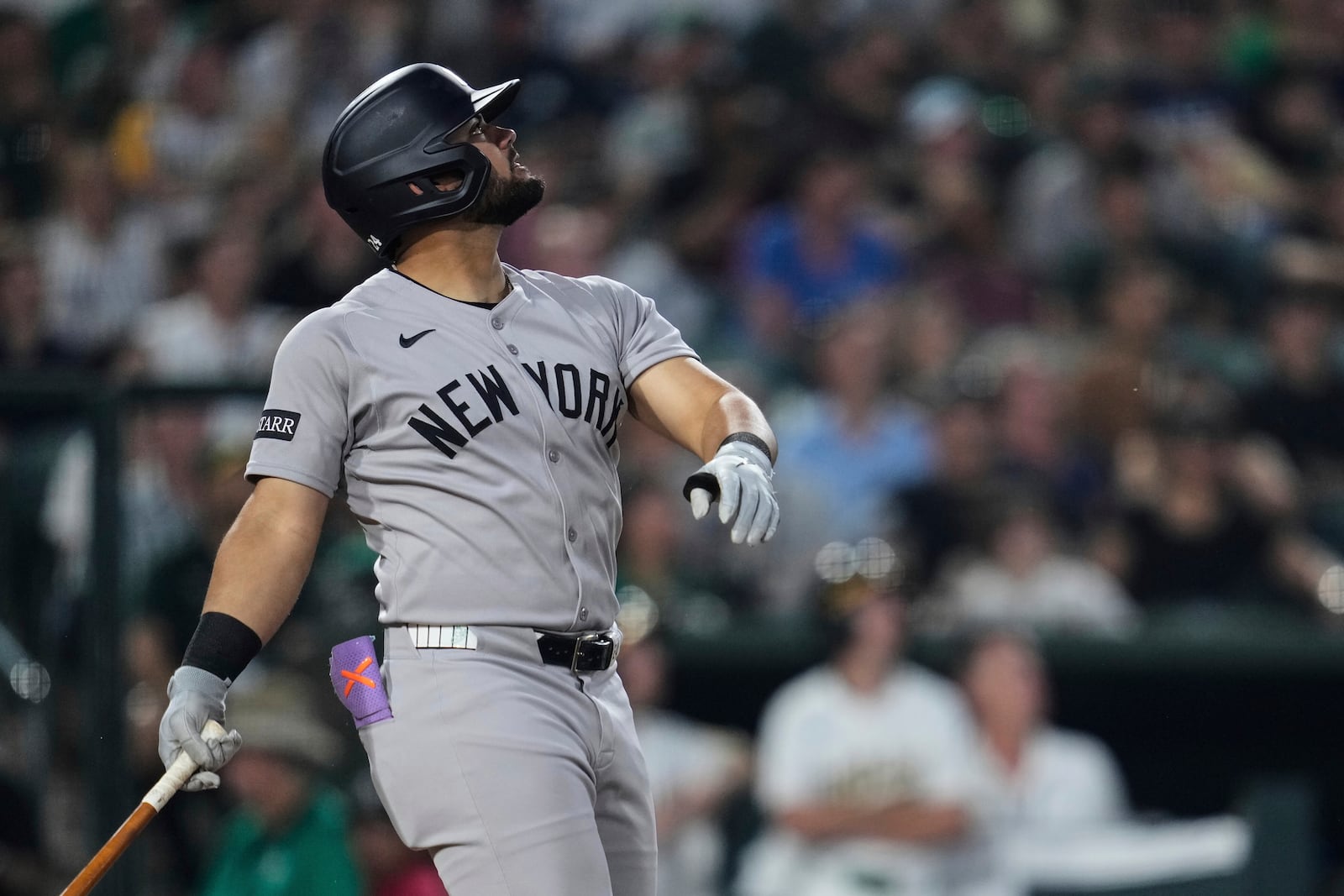 New York Yankees' Jasson Domínguez watches his sacrifice fly during the fifth inning of a baseball game against the Athletics, Friday, May 9, 2025, in West Sacramento, Calif. (AP Photo/Godofredo A. Vásquez)