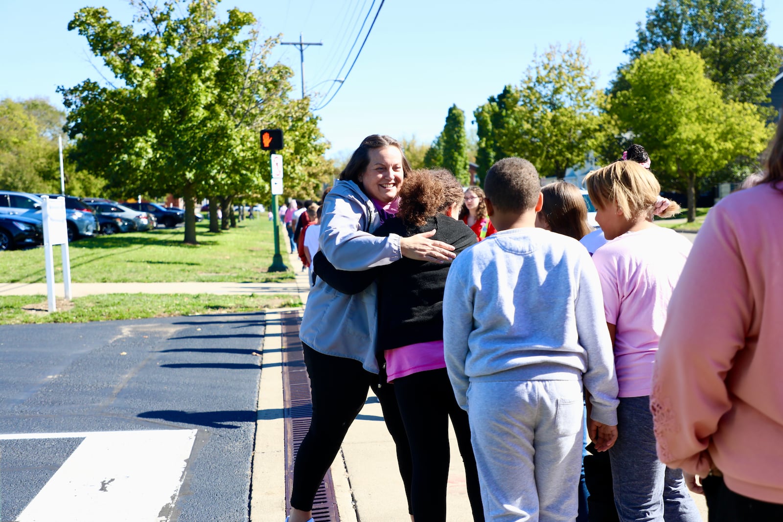 Lagonda Elementary students and staff held a walk around the school building in honor of Breast Cancer Awareness Month and to show support for first grade teacher Laurie Hammontree, who is celebrating five years of being cancer-free. Contributed