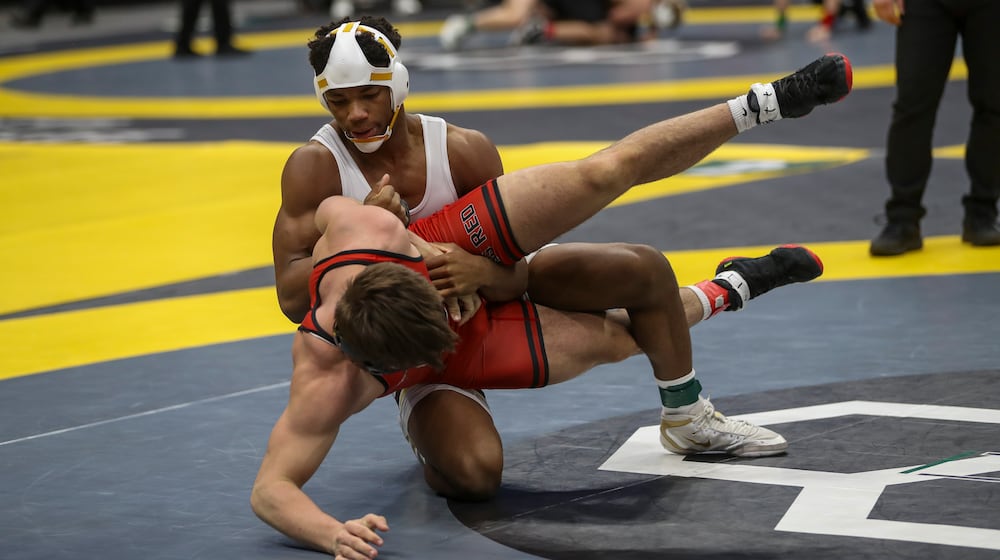 Alter High School junior Rod Owens competes at the Ohio High School Athletic Association state wrestling championships on Friday, March 7 at the Schottenstein Center in Columbus. Owens won the Division II state title in the 175 pound weight class. Dave Thompson/CONTRIBUTED