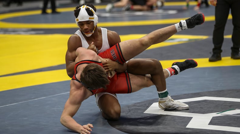 Alter High School junior Rod Owens competes at the Ohio High School Athletic Association state wrestling championships on Friday, March 7 at the Schottenstein Center in Columbus. Owens won the Division II state title in the 175 pound weight class. Dave Thompson/CONTRIBUTED