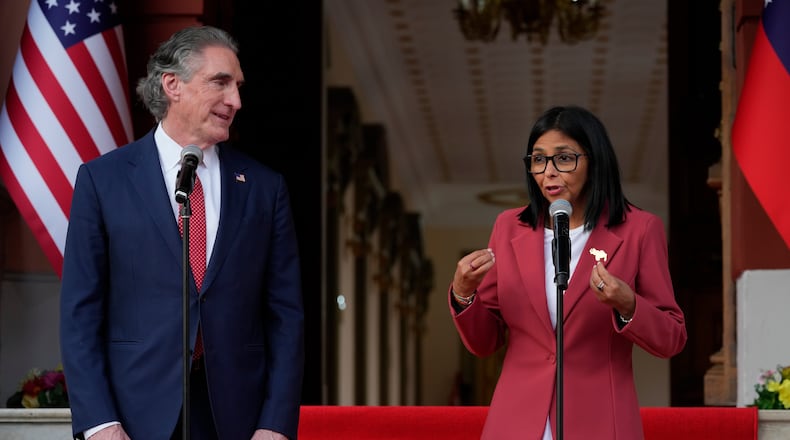 Venezuela's acting President Delcy Rodriguez, right, delivers joint remarks with U.S. Interior Secretary Doug Burgum at Miraflores presidential palace in Caracas, Venezuela, Wednesday, March 4, 2026. (AP Photo/Ariana Cubillos)