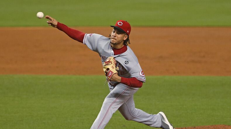 Cincinnati Reds pitcher Luis Castillo works during the third inning against the Miami Marlins at Marlins Park in Miami on Tuesday, Aug. 27, 2019. (David Santiago/Miami Herald/TNS)