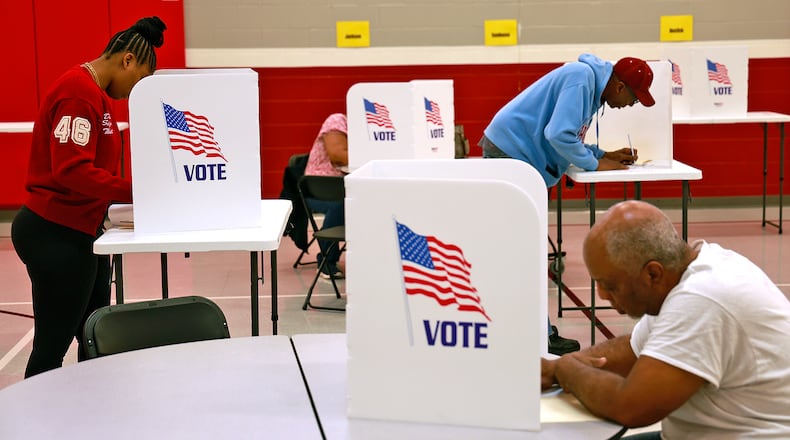 Voters fill out their ballots Tuesday, Nov. 5, 2024 at Perrin Woods Elementary in Springfield.  BILL LACKEY/STAFF
