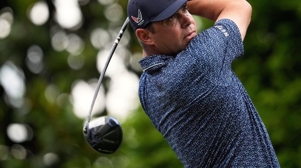 FILE - Gary Woodlands watches his tee shot on the 16th hole during a practice round for the PGA Championship golf tournament at the Quail Hollow Club, May 14, 2025, in Charlotte, N.C. (AP Photo/George Walker IV, File)