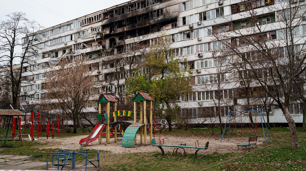 A residential building is seen heavily damaged after a Russian strike on Kyiv, Ukraine, on Tuesday, Nov. 25, 2025. (AP Photo/Evgeniy Maloletka)