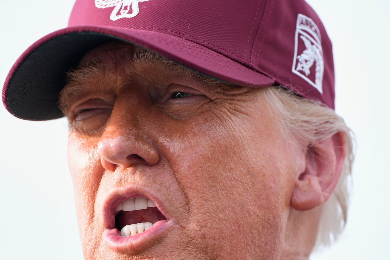 President Donald Trump speaks to reporters after arriving on Air Force One, Tuesday, June 10, 2025, at Joint Base Andrews, Md. (AP Photo/Alex Brandon)
