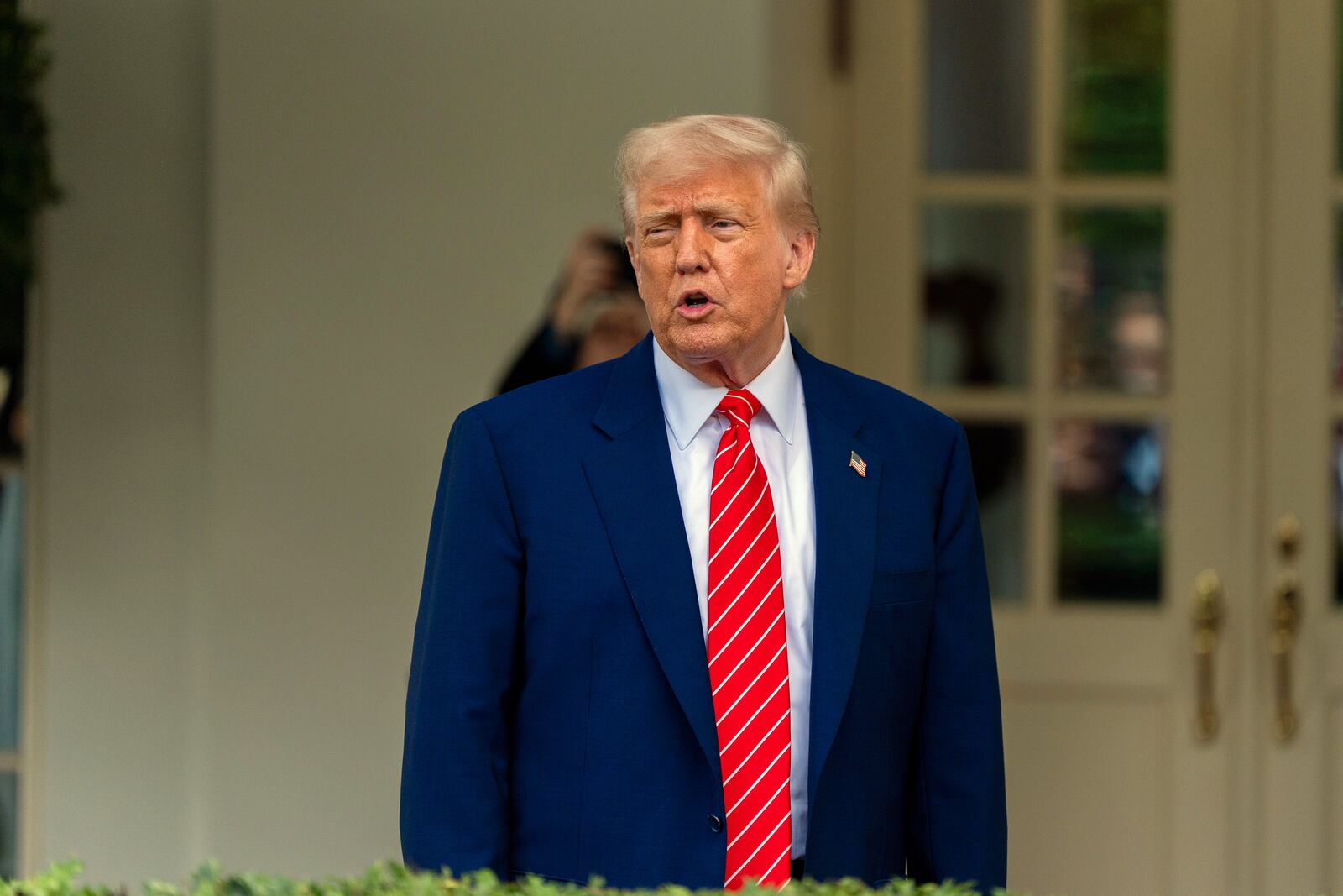 President Donald Trump speaks with reporters in front of the West Wing of the White House, Thursday, May 8, 2025, in Washington. (AP Photo/Alex Brandon)