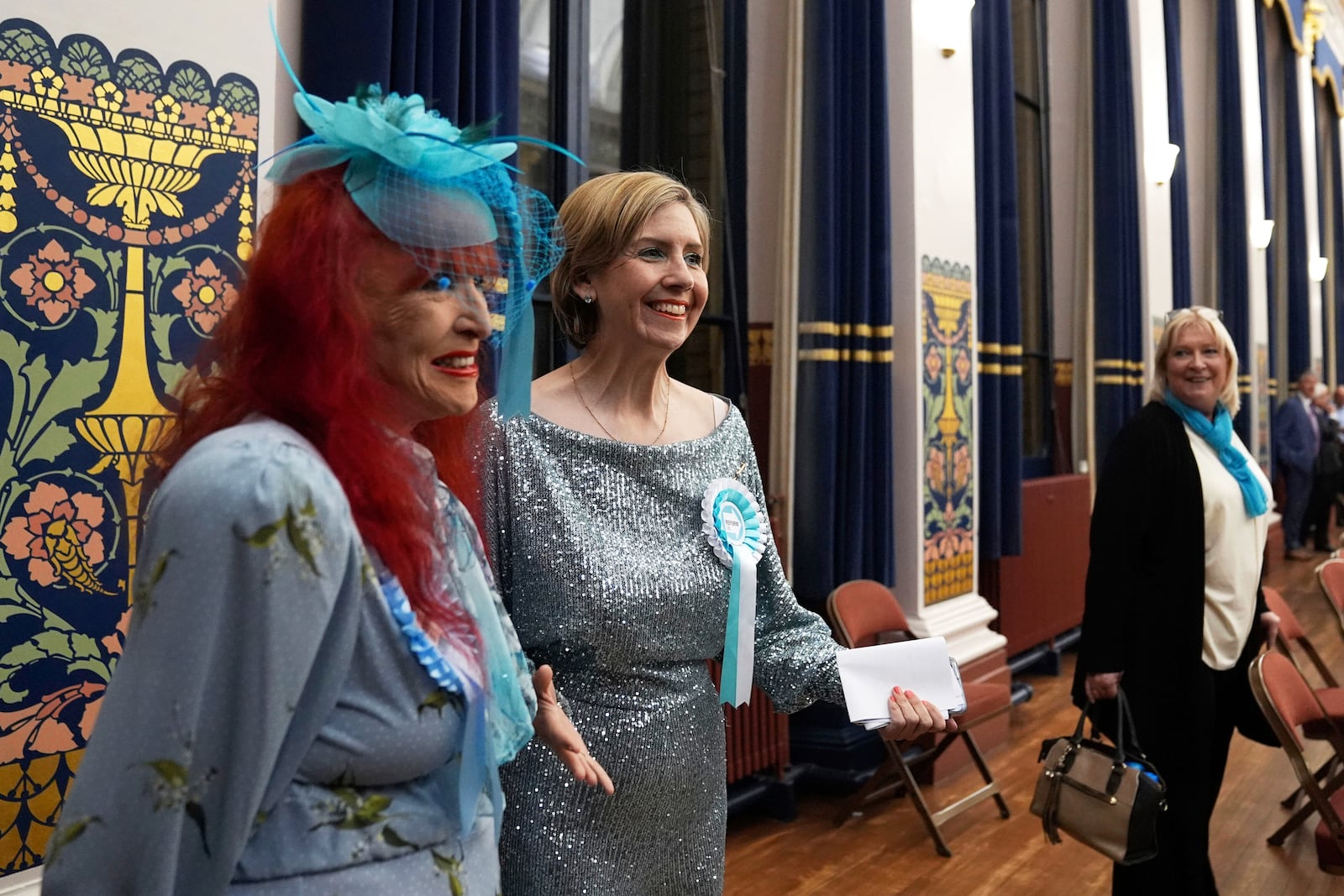Reform U.K.'s Greater Lincolnshire mayoral candidate Dame Andrea Jenkyns, center, gestures during the count at Grimsby Town Hall, in Lincolnshire, England, for the Greater Lincolnshire Mayor election, Friday, May 2, 2025. (Joe Giddens/PA via AP)
