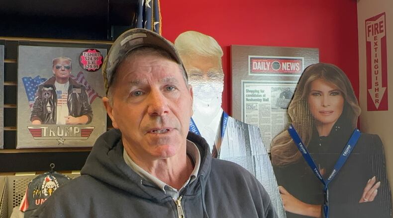 Paul Bonner, 67, talks at the Trump Store in Bensalem Pa., Monday, Jan. 5, 2026, looking for a Trump 2028 sign. Speaking about the U.S. raid that captured Venezuela's president. Bonner said he supports Trump "so far." (AP Photo/ Mike Catalini)