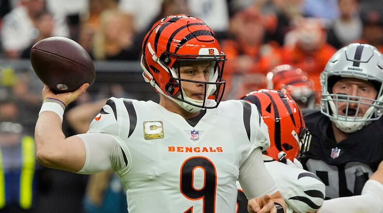Cincinnati Bengals quarterback Joe Burrow (9) throws against the Las Vegas Raiders during the first half of an NFL football game, Sunday, Nov. 21, 2021, in Las Vegas. (AP Photo/Rick Scuteri)