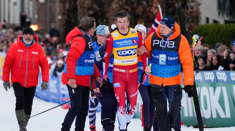 Norway's Johannes Hoesflot Klaebo walks after a fall during the World Cup sprint cross-country race in Drammen, Norway, Thursday March 12, 2026. (Lise Aserud/NTB Scanpix via AP)