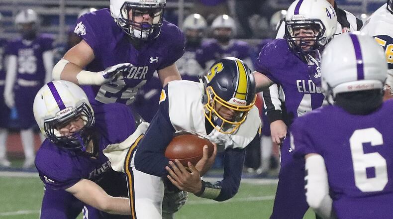 Springfield’s Te’Sean Smoot on a quarterback keeper against Elder in the Division I state semifinals on Nov. 29, 2019, at Piqua. BILL LACKEY/STAFF