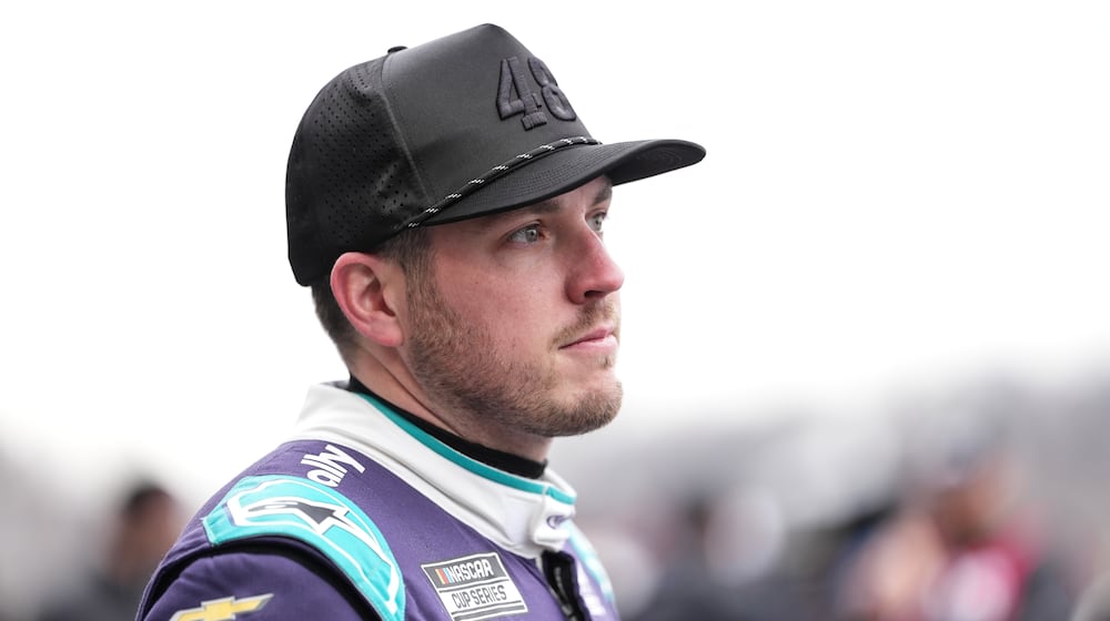 FILE - Alex Bowman looks on prior to NASCAR's The Clash preseason auto race, Feb. 4, 2026, in Winston-Salem, N.C. (AP Photo/Matt Kelley, File)