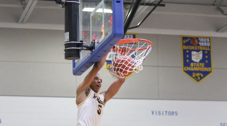 Springfield High School’s RaHeim Moss finishes a dunk during a game earlier this season. The high-flying senior is averaging 17.7 points and 7.7 rebounds per game for the Wildcats. CONTRIBUTED PHOTO BY MICHAEL COOPER