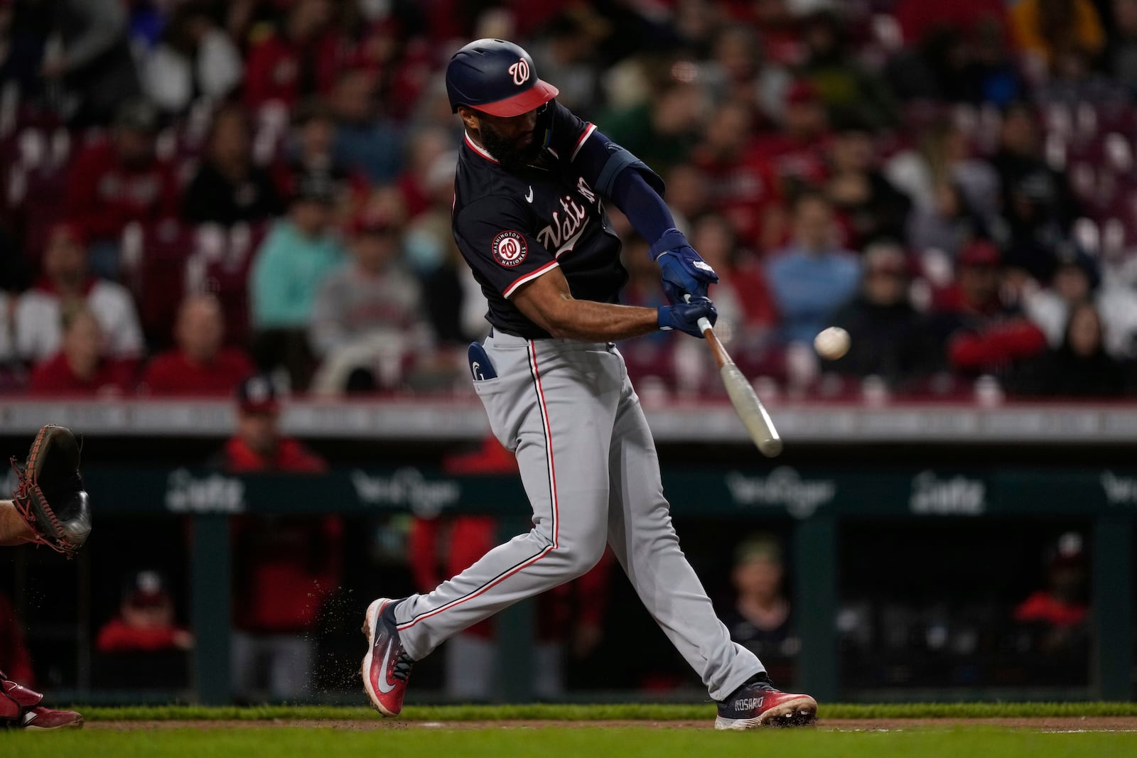 Washington Nationals' Amed Rosario hits a three-run home run in the sixth inning of a baseball game against the Cincinnati Reds, Saturday, May 3, 2025, in Cincinnati. (AP Photo/Carolyn Kaster)