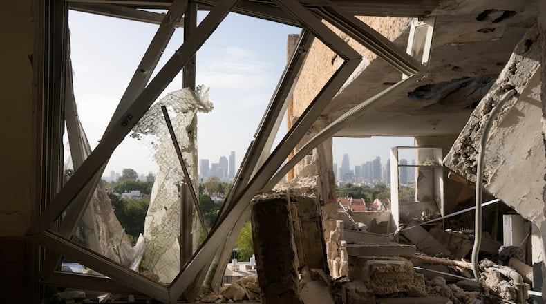 Damaged apartment following an Iranian missile strike in Tel Aviv, Israel, March 19, 2026. (AP Photo/Maya Levin)