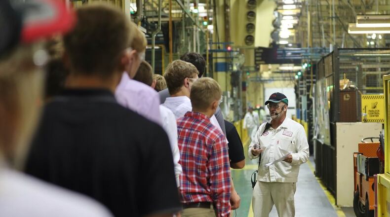 Honda Anna engine plant employee Mark Bollheimer hosts a plant tour with area high school students in 2018. CONTRIBUTED.
