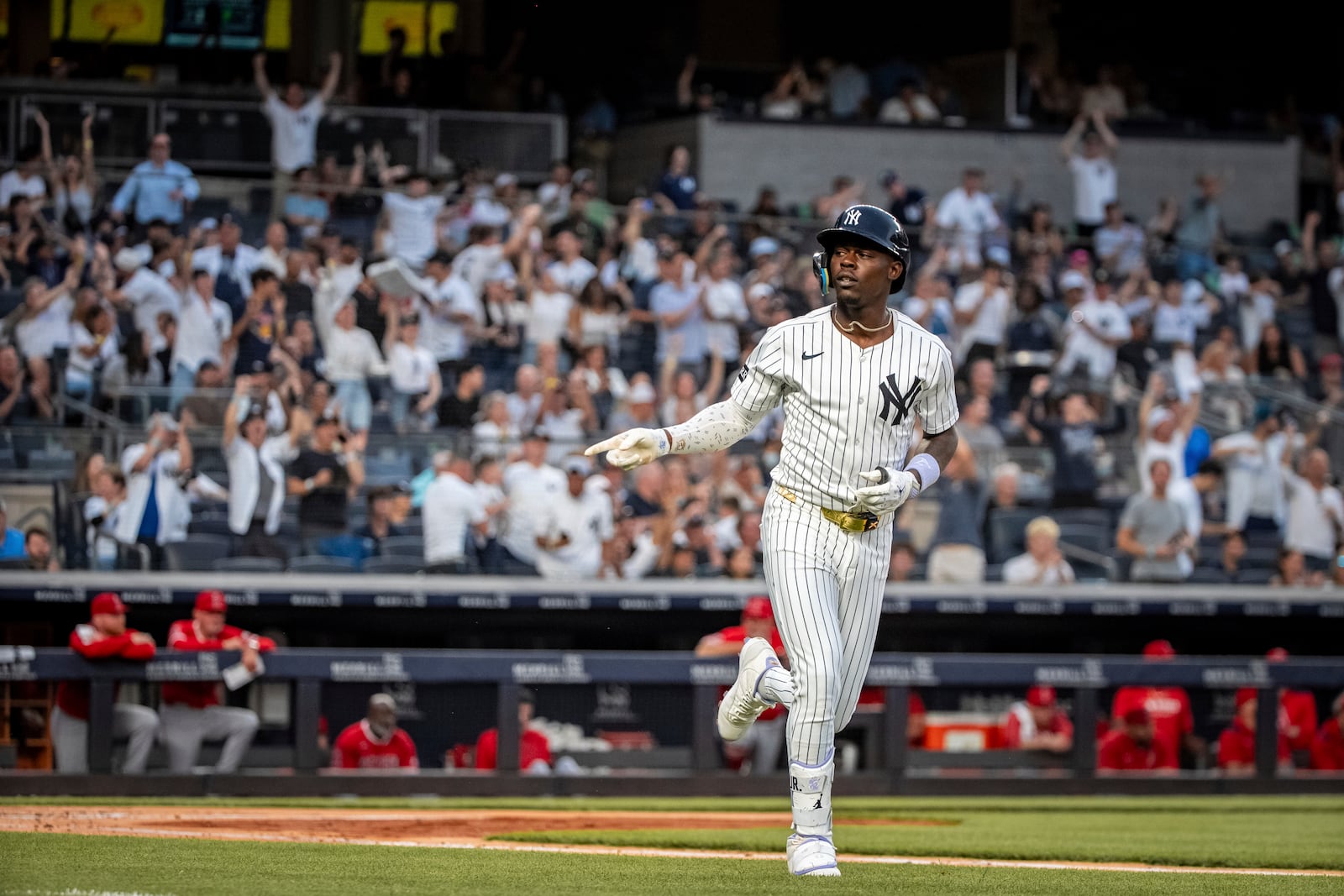 New York Yankees' Jazz Chisholm Jr. (13) celebrates a home run during the second inning of a baseball game against the Los Angeles Angels, Wednesday, June 18, 2025, in New York. (AP Photo/Angelina Katsanis)