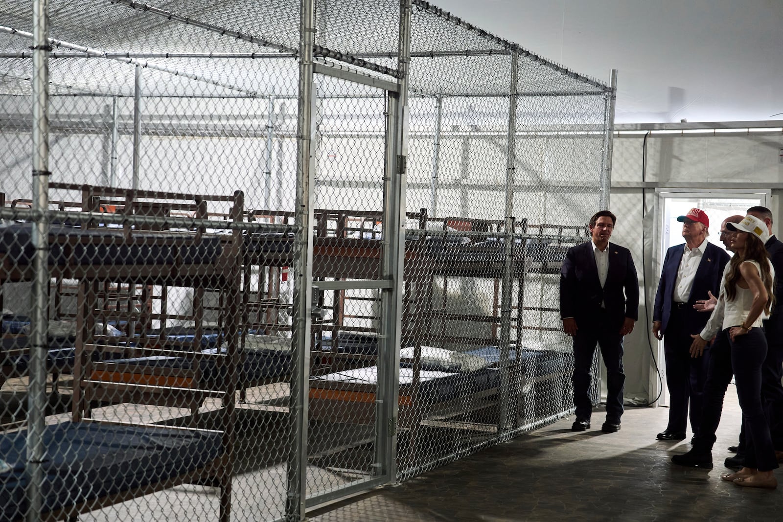President Donald Trump tours "Alligator Alcatraz," a new migrant detention facility at Dade-Collier Training and Transition facility, Tuesday, July 1, 2025, in Ochopee, Fla. (AP Photo/Evan Vucci)