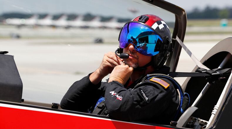 Aerobatic pilot Rob Holland prepares for a flight eon Wednesday in preparation for the Vectren Dayton Air Show this coming weekend. TY GREENLEES / STAFF