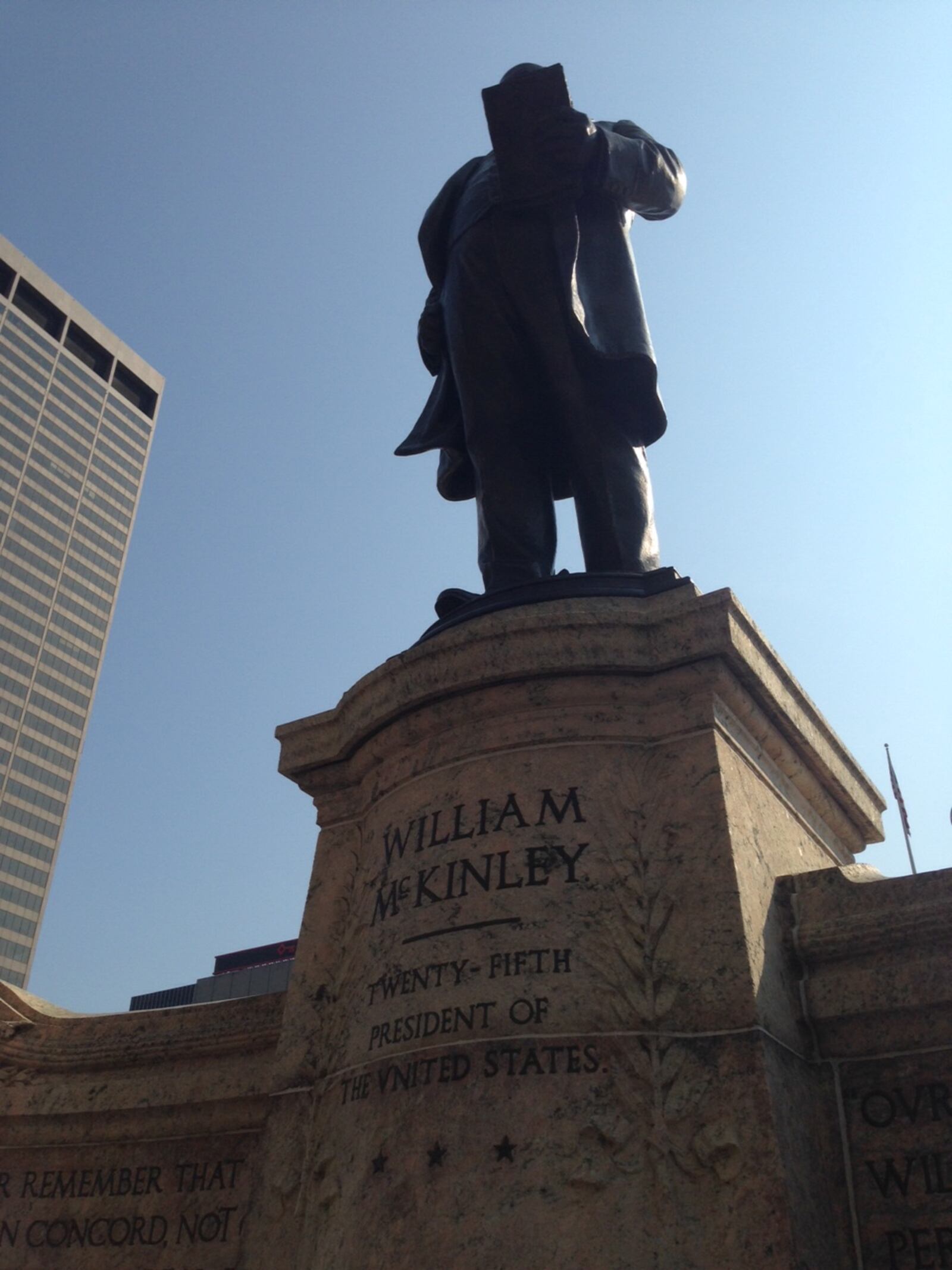 A statue of William McKinley stands guard in front of the Ohio Statehouse.