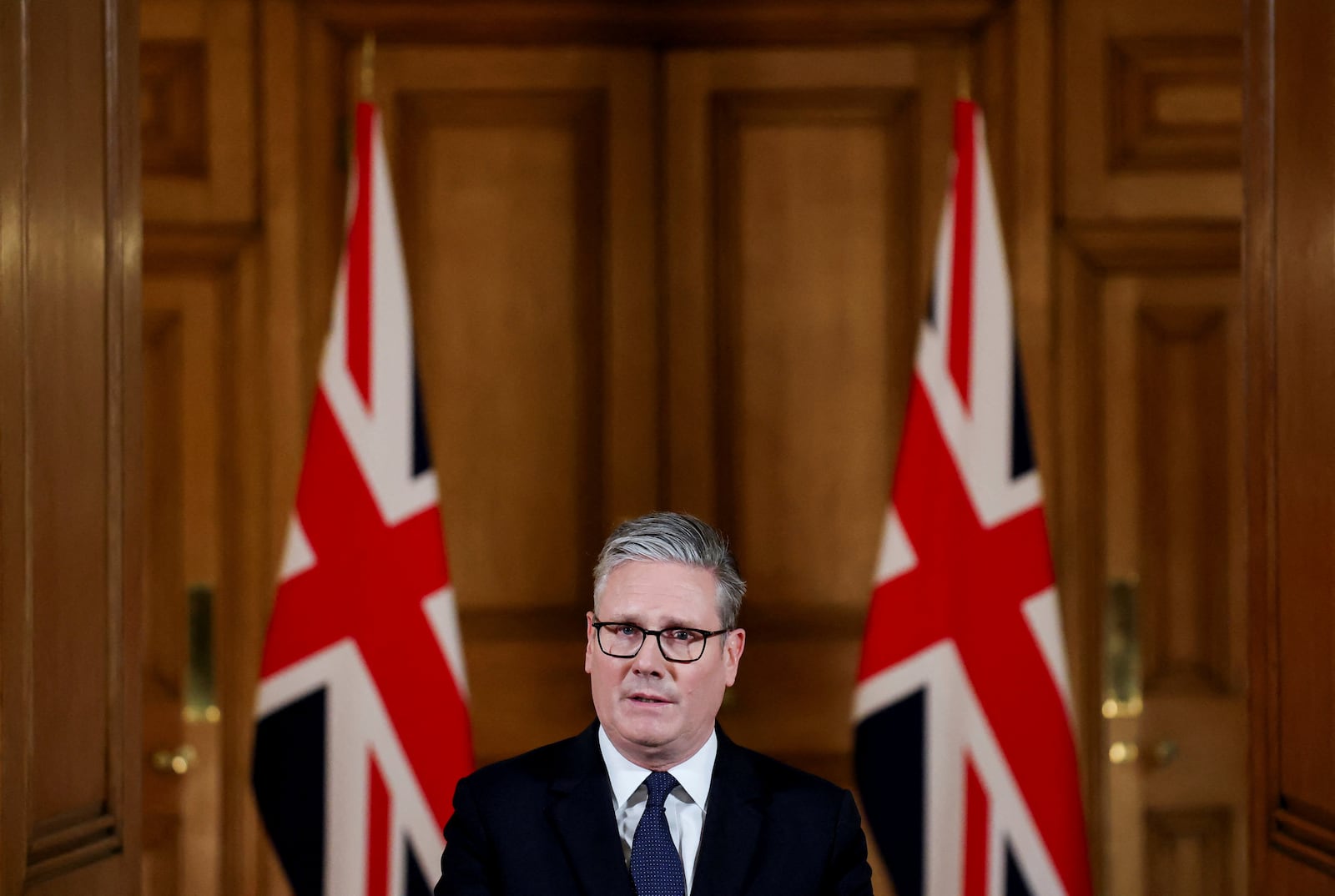 Britain's Prime Minister Keir Starmer delivers a statement inside No. 10 Downing Street on the day the cabinet was recalled to discuss the situation in Gaza, in London, Tuesday, July 29, 2025. (Toby Melville, Pool Photo via AP)