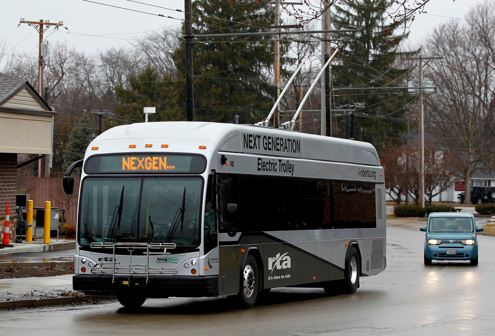 The NexGen electric trolley reaches the end of the route 5 trolley line on Southmoor Circle in Kettering. LISA POWELL / STAFF
