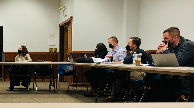 Members of the Greene County Board of Elections (left) met with Ohio Deputy Assistant Secretary of State Amanda Grandjean (center) and her team (right) Monday to discuss remedying administrative issues that led to the delay of results in the November 2021 election.