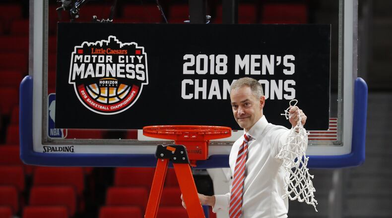Wright State head coach Scott Nagy celebrates their 74-57 win against Cleveland State after an NCAA basketball game in the Horizon League tournament championship in Detroit, Tuesday, March 6, 2018. (AP Photo/Paul Sancya)