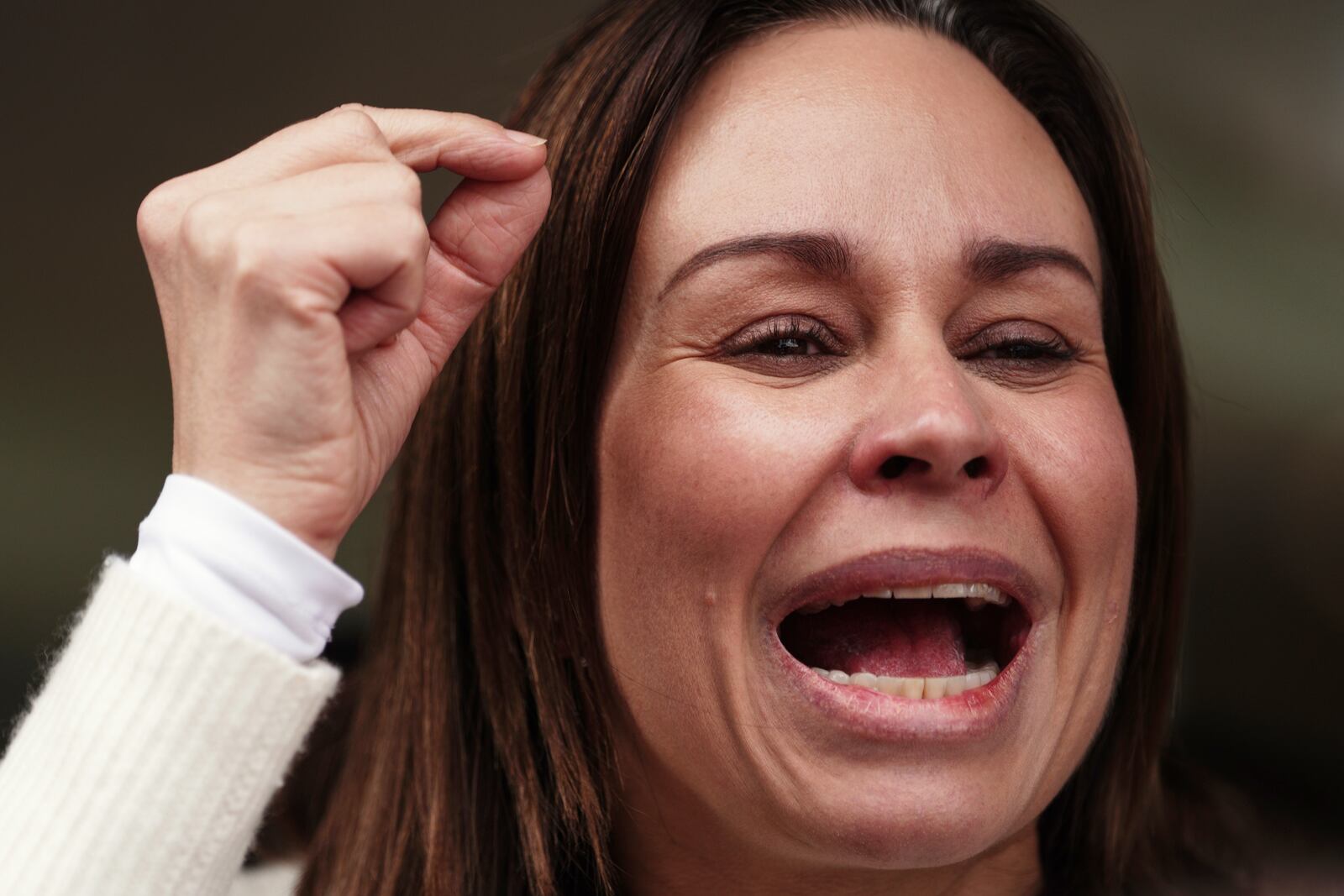 Maria Claudia Tarazona, the wife of Colombian Senator Miguel Uribe Turbay who was shot at a political rally, talks to the press outside the clinic where he is being treated in Bogota, Colombia, Tuesday, June 10, 2025. (AP Photo/Ivan Valencia)