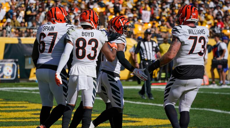 Cincinnati Bengals wide receiver Ja'Marr Chase (1) celebrates with teammates after he caught a touchdown pass against the Pittsburgh Steelers during the second half an NFL football game, Sunday, Sept. 26, 2021, in Pittsburgh. (AP Photo/Gene J. Puskar)