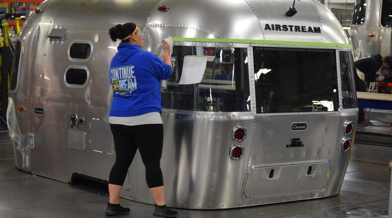 Airstream's Jackson Center operation will grow in late December when travel trailer manufacturing moves into a new 750,000 square-foot, $50 million facility.  Production in the new Shelby County facility will begin at the start of the new year. About 960 people work at the Airstream operation in Jackson Center. Workers who manufacture motor homes across the street will move into the former travel trailer manufacturing plant and service will move into the former motor home facility. STAFF PHOTOS / HOLLY SHIVELY