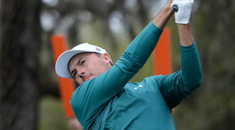 Jordan Spieth hits off the 12th tee during the second round of The Players Championship golf tournament Friday, March 13, 2026, in Ponte Vedra Beach, Fla. (AP Photo/Gerald Herbert)