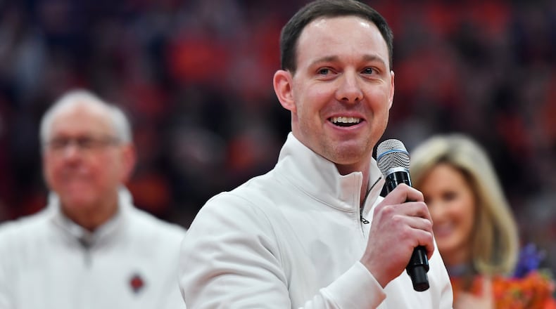 FILE - Syracuse assistant coach Gerry McNamara, now head coach at Siena, gives remarks at his jersey retirement ceremony after an NCAA college basketball game against Wake Forest in Syracuse, N.Y., Saturday, March 4, 2023. (AP Photo/Adrian Kraus, File)